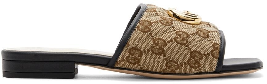 

Бежевые шлепанцы из плотной ткани с узором GG Gucci