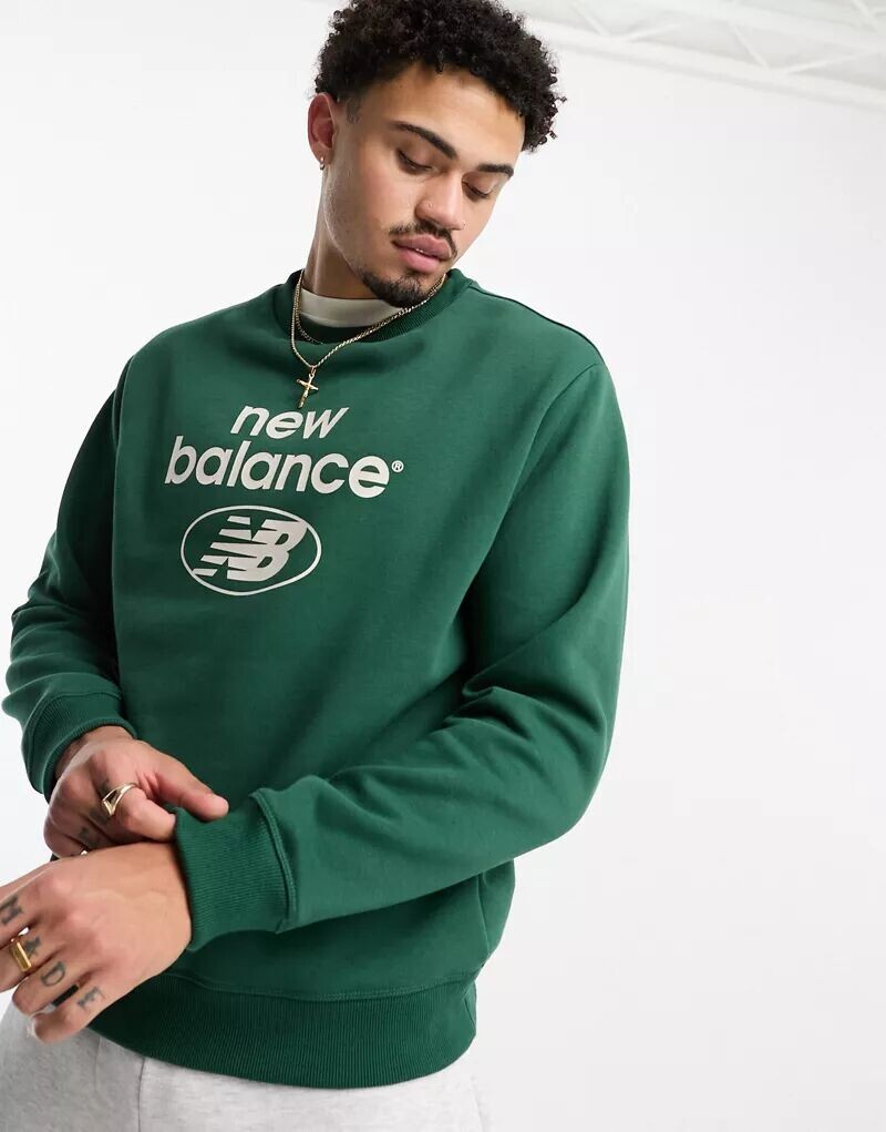 

Зеленый свитшот New Balance Essentials Novelty