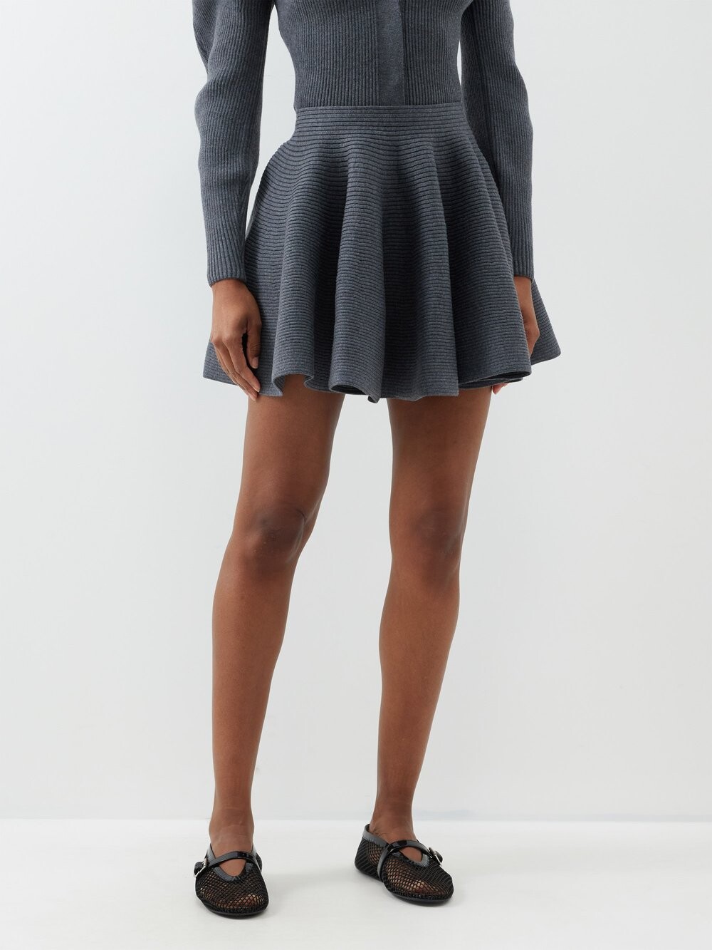 

Расклешенная мини-юбка рельефной вязки из смесовой шерсти ALAÏA, серый
