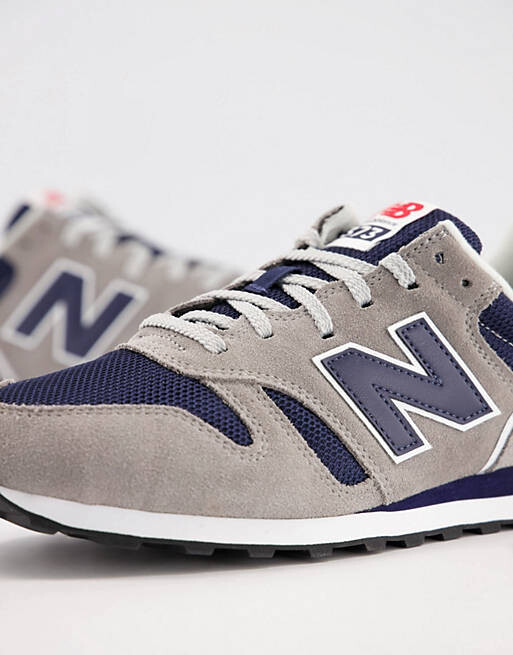 

Кроссовки New Balance 373 серого и темно-синего цвета