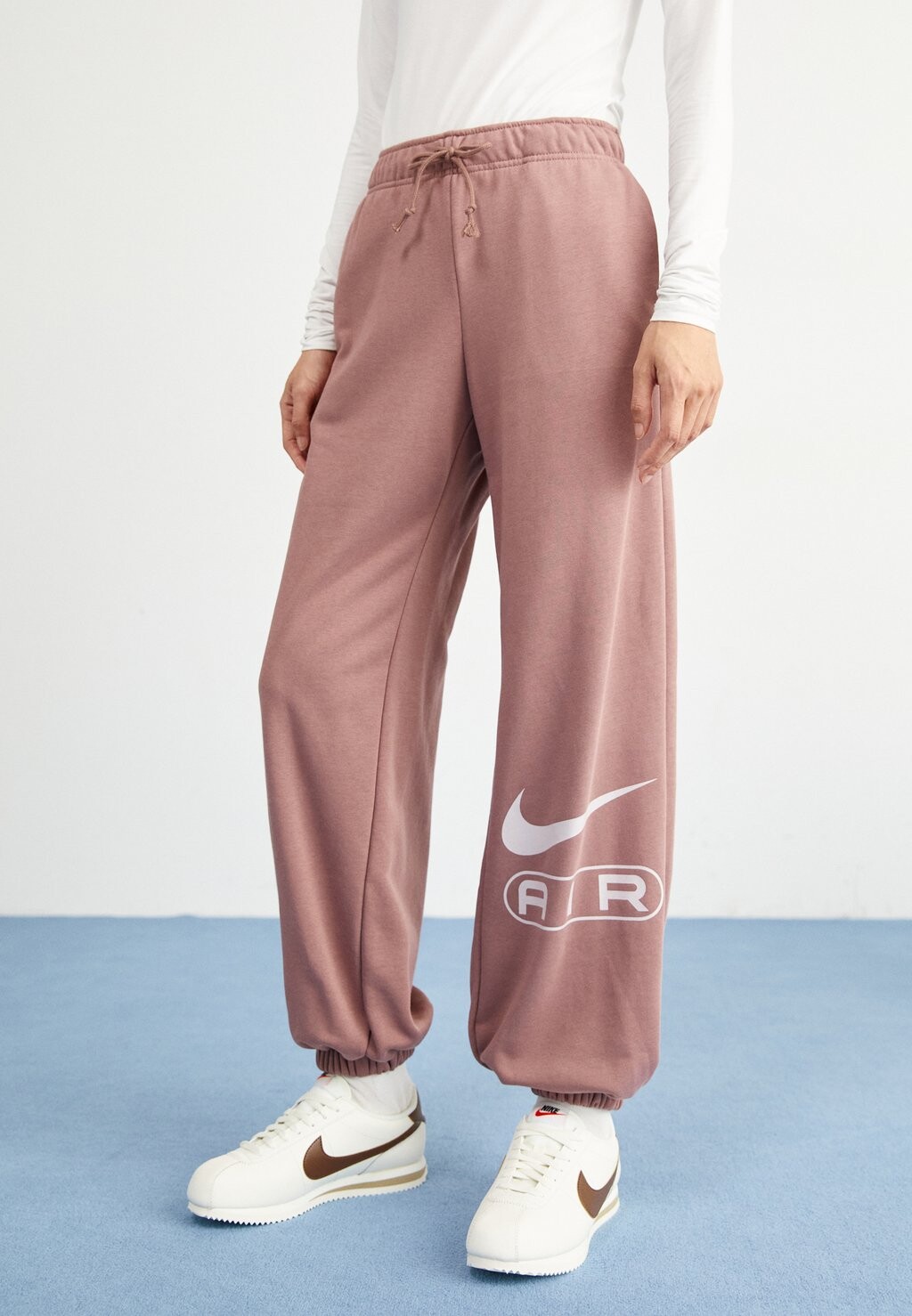

Брюки для бега AIR JOGGER Nike Sportswear, цвет smokey mauve