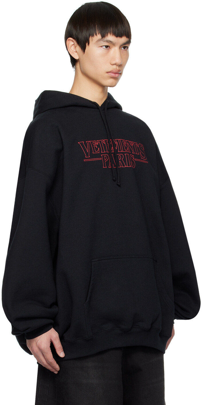 

Черный худи с принтом VETEMENTS