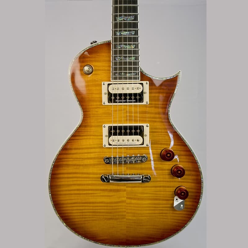 

Электрогитара ESP LTD EC-1000ASB Electric Guitar Amber Sunburst with Free Pro Setup