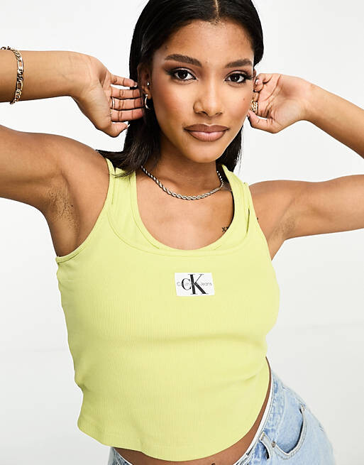 

Золотая двухслойная майка в рубчик с логотипом Calvin Klein