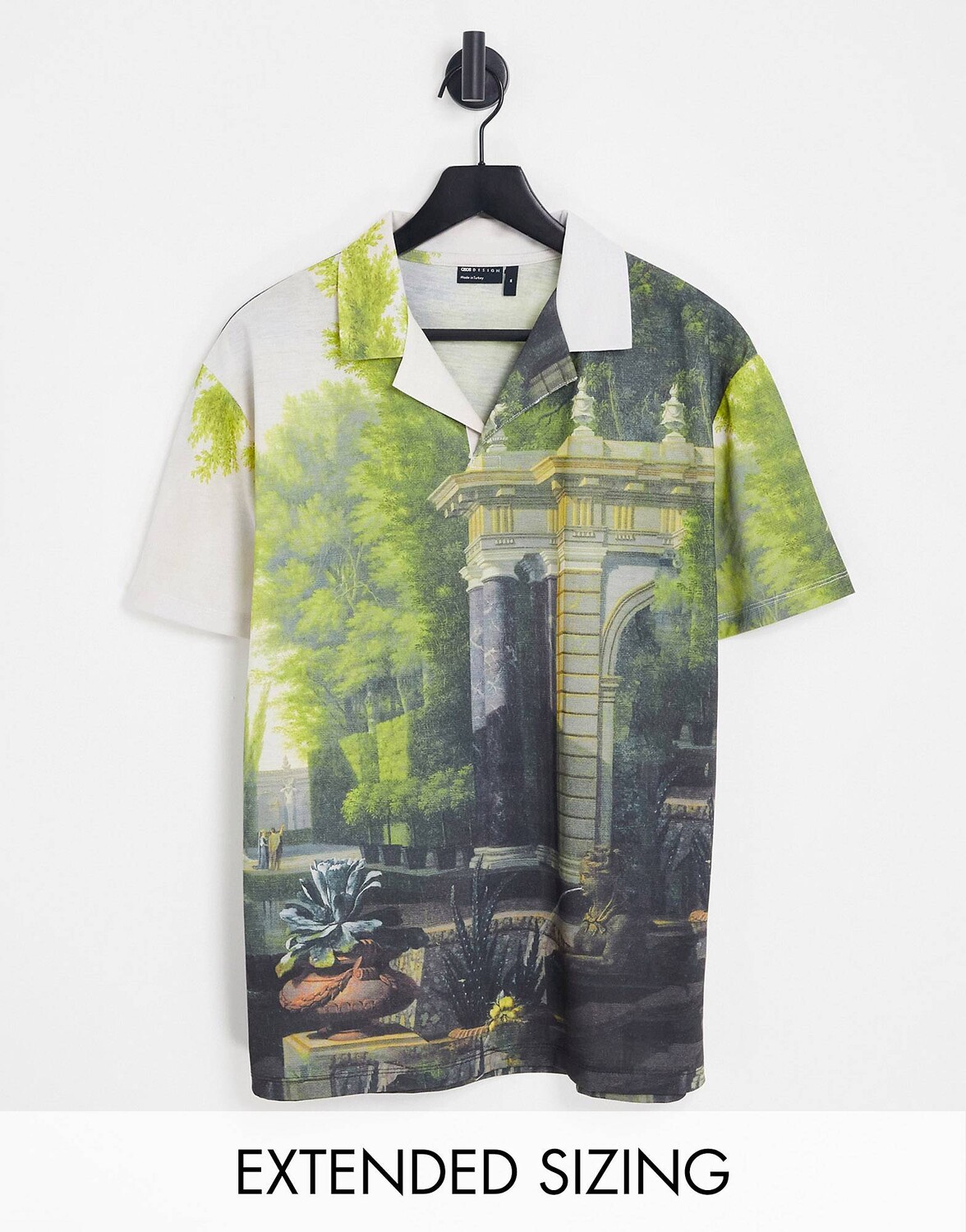 

Свободная рубашка-поло с живописным принтом ASOS DESIGN
