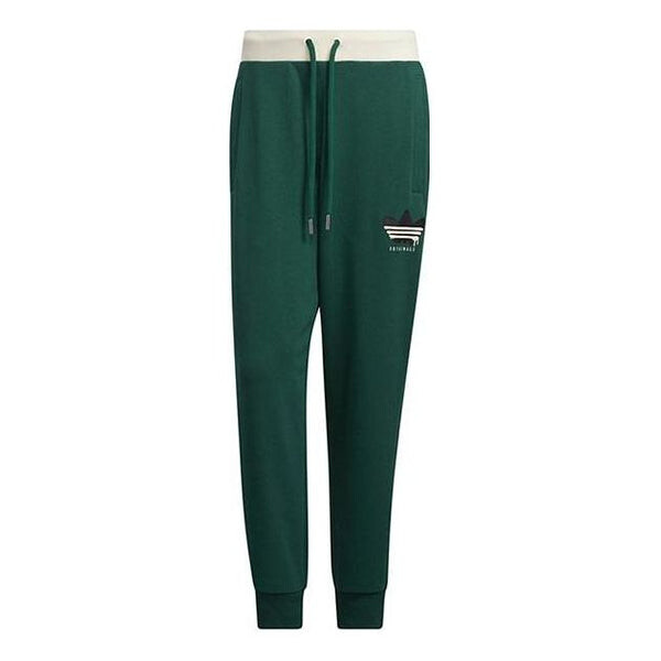 

Спортивные брюки Adidas Anti University Sweatpants HY7228, зеленый