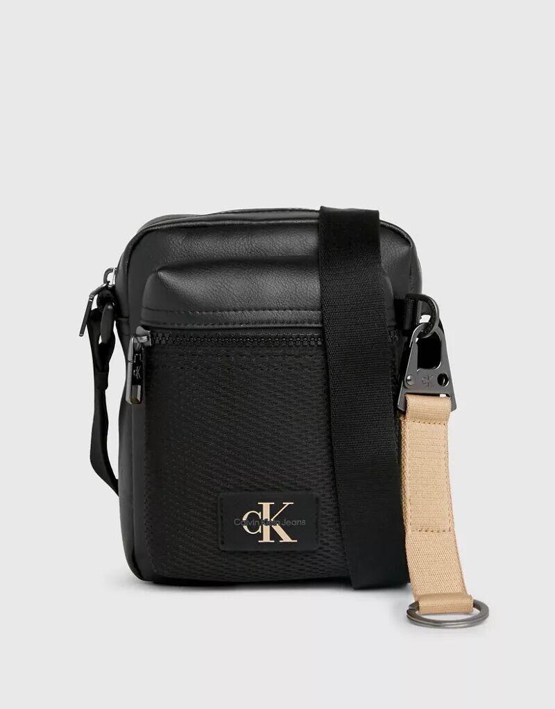 

Черная репортерская сумка Calvin Klein