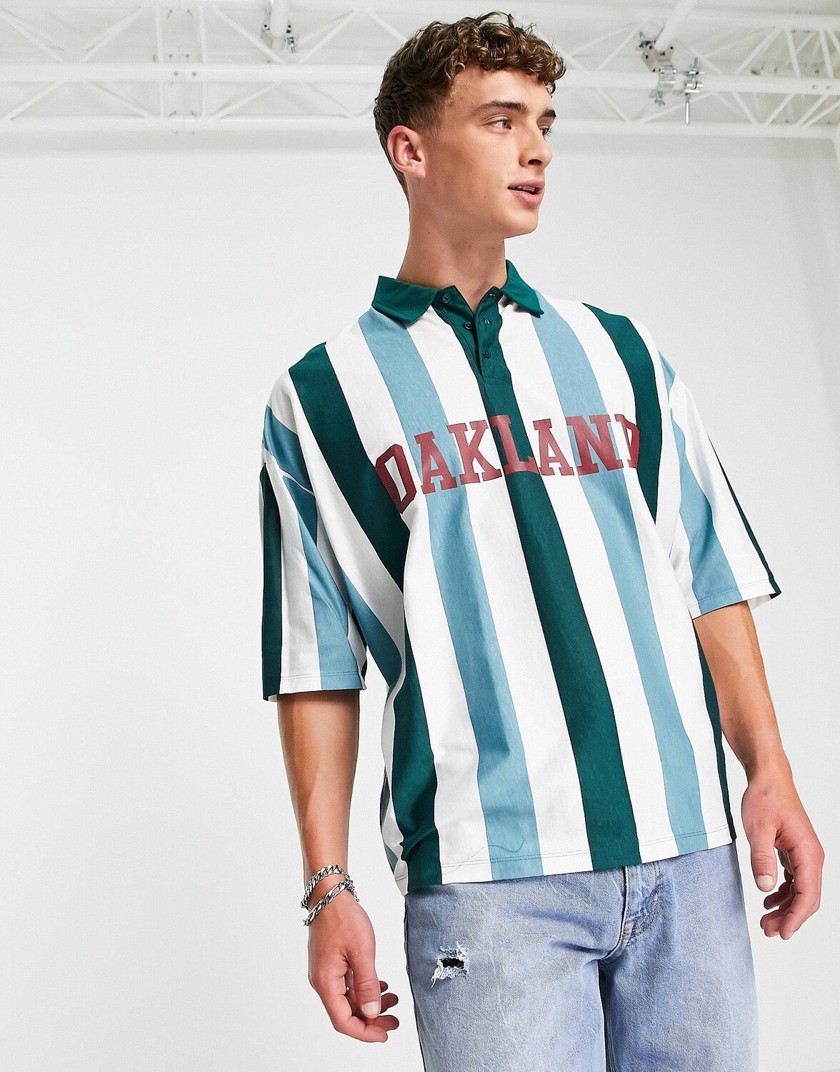 

Oversize-футболка поло в зеленую полоску с принтом Окленд ASOS DESIGN