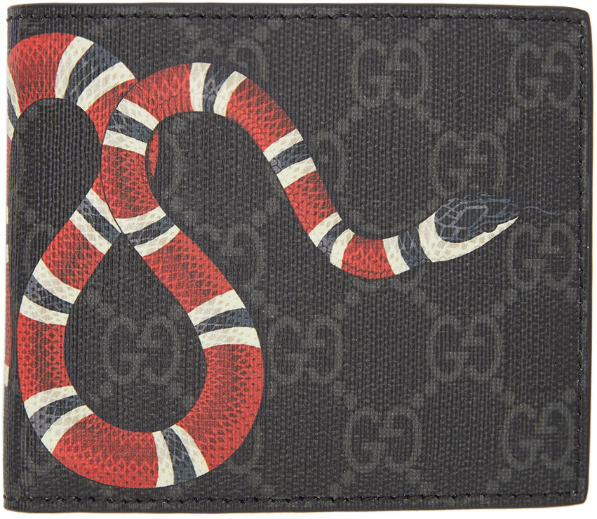 

Черный кошелек GG Supreme со змеиным рисунком Gucci