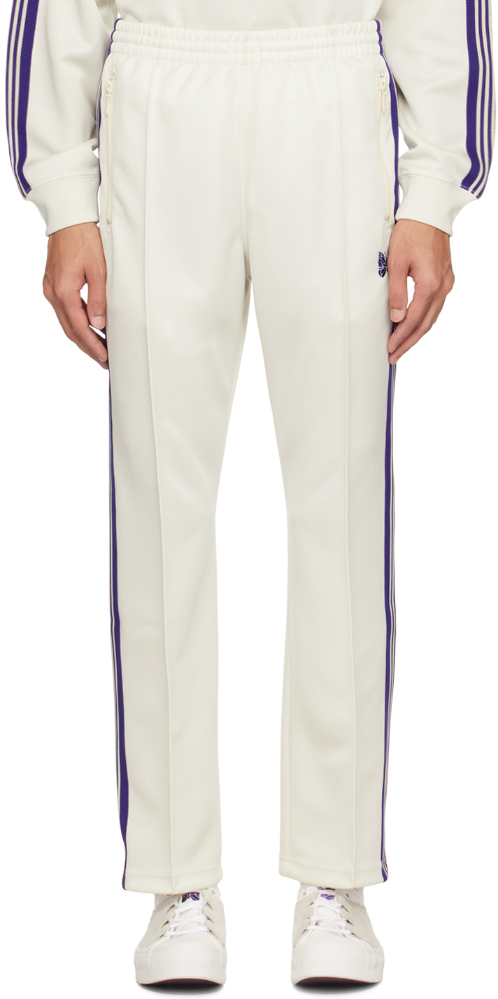 Белые узкие спортивные штаны NEEDLES белые спортивные брюки с вышивкой needles