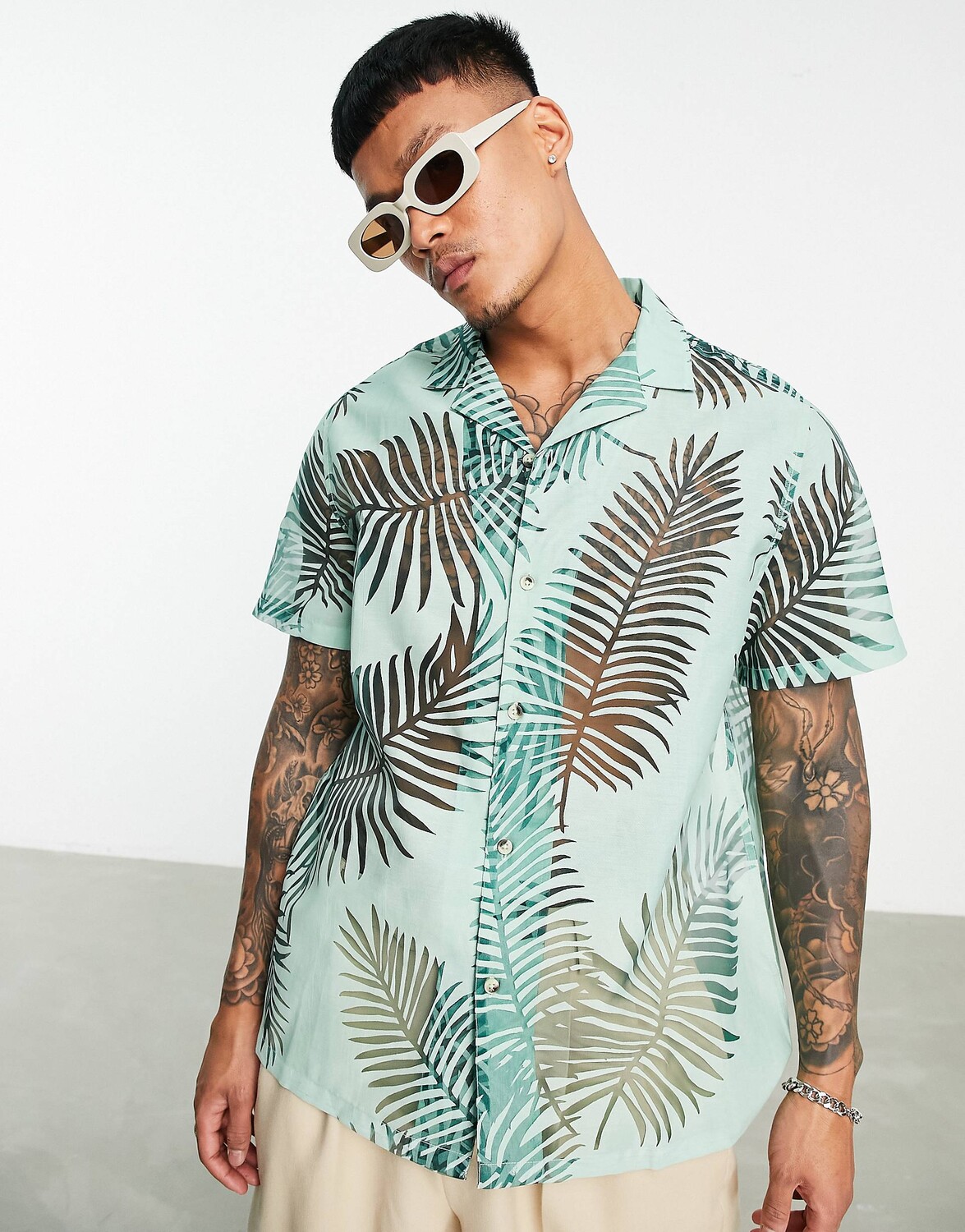 

Зеленая свободная рубашка с принтом выгоревших ладоней ASOS DESIGN