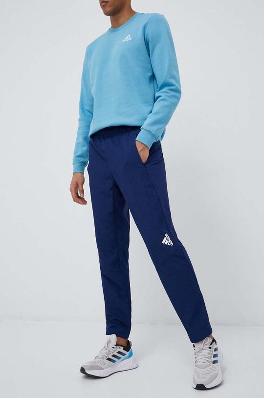 Спортивные брюки , созданные для движения adidas, темно-синий фотографии