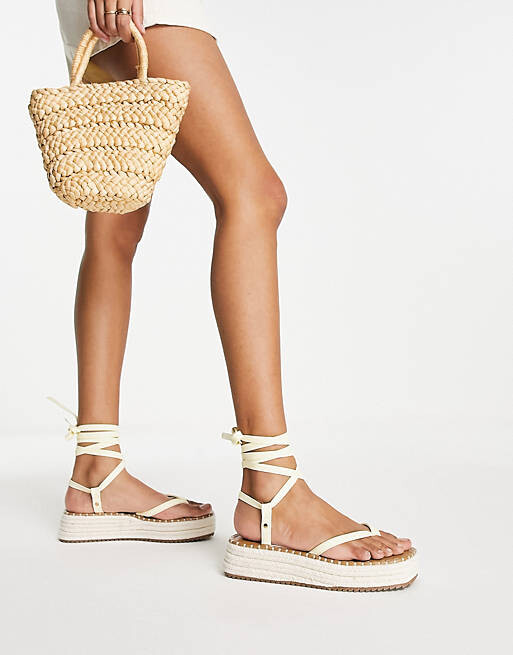 

Желтые эспадрильи на плоской форме ASOS DESIGN Joanna