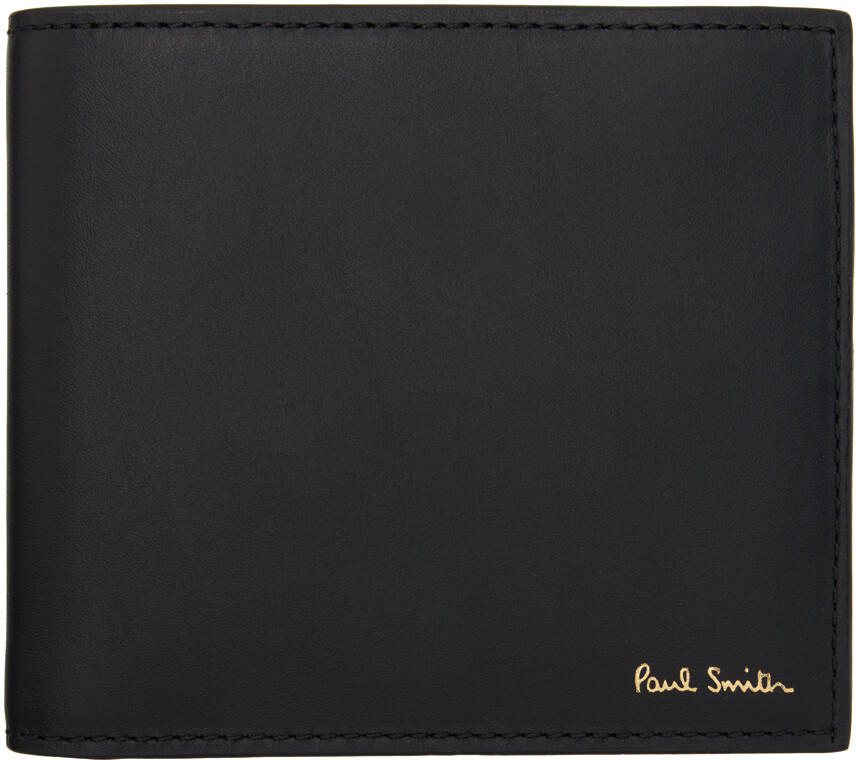 

Черный кожаный кошелек с отделкой в фирменную полоску Paul Smith