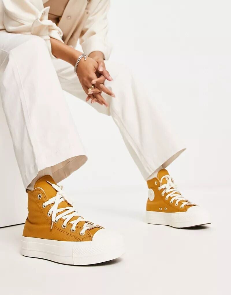 

Золотистые кроссовки Converse Chuck Taylor All Star Lift Hi на платформе