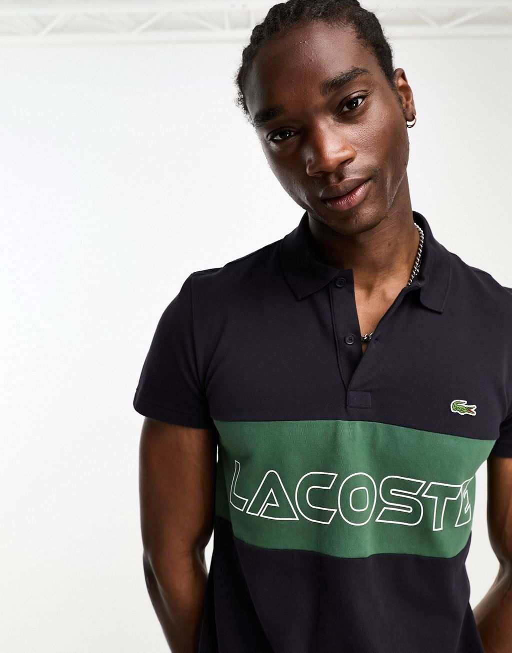 

Темно-синяя рубашка-поло в стиле колор-блок Lacoste