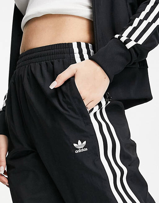 

Черные спортивные брюки с тремя полосками adidas Originals Lock Up