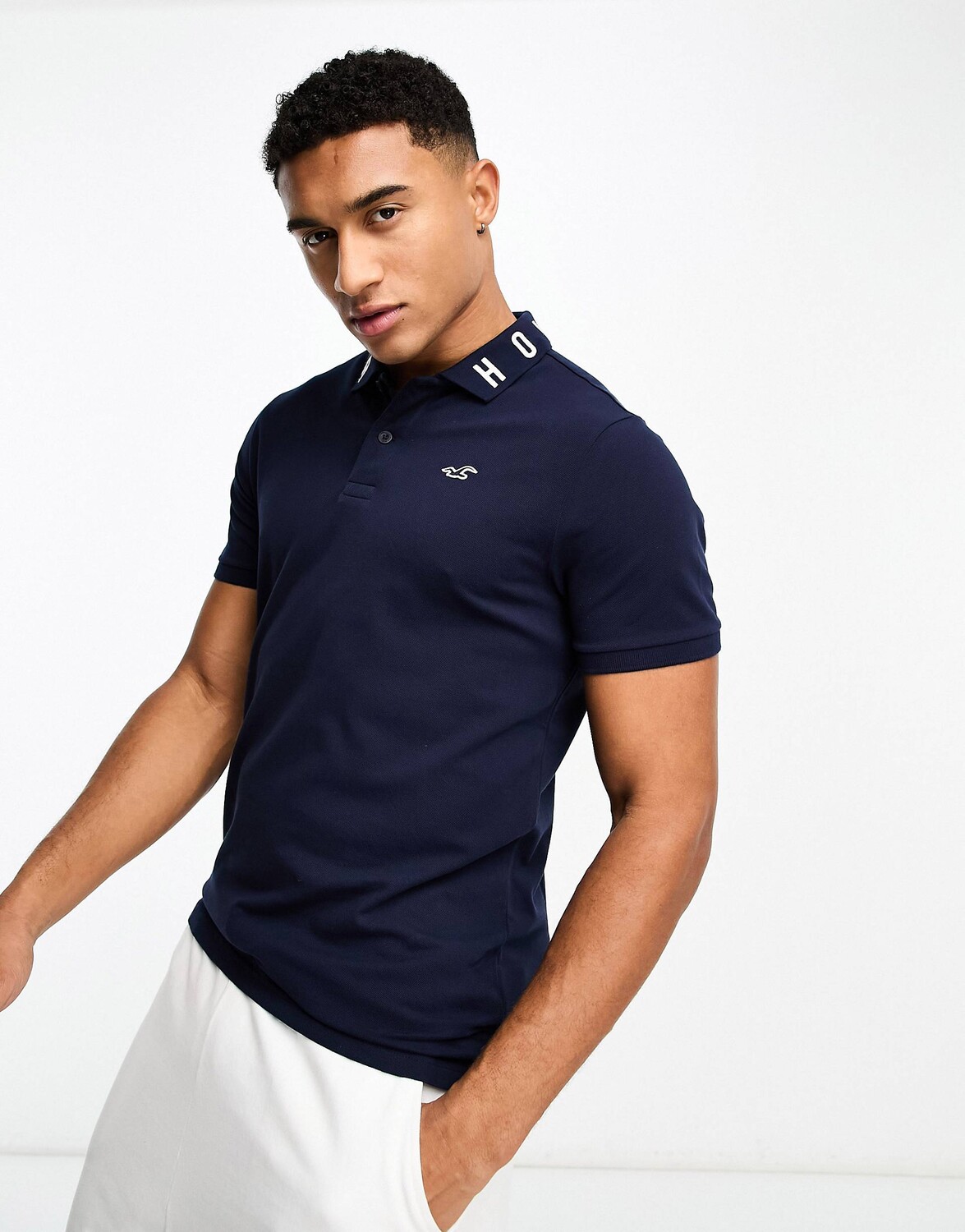 

Темно-синее поло из пике с воротником и логотипом Hollister, Синий