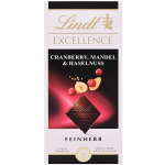 Темный шоколад с кусочками сушеной клюквы, миндалем и фундуком Lindt, 100 г - фото