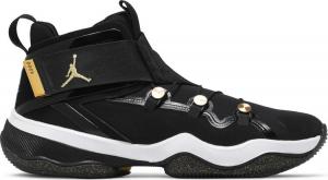 Black and sales gold jordans 23