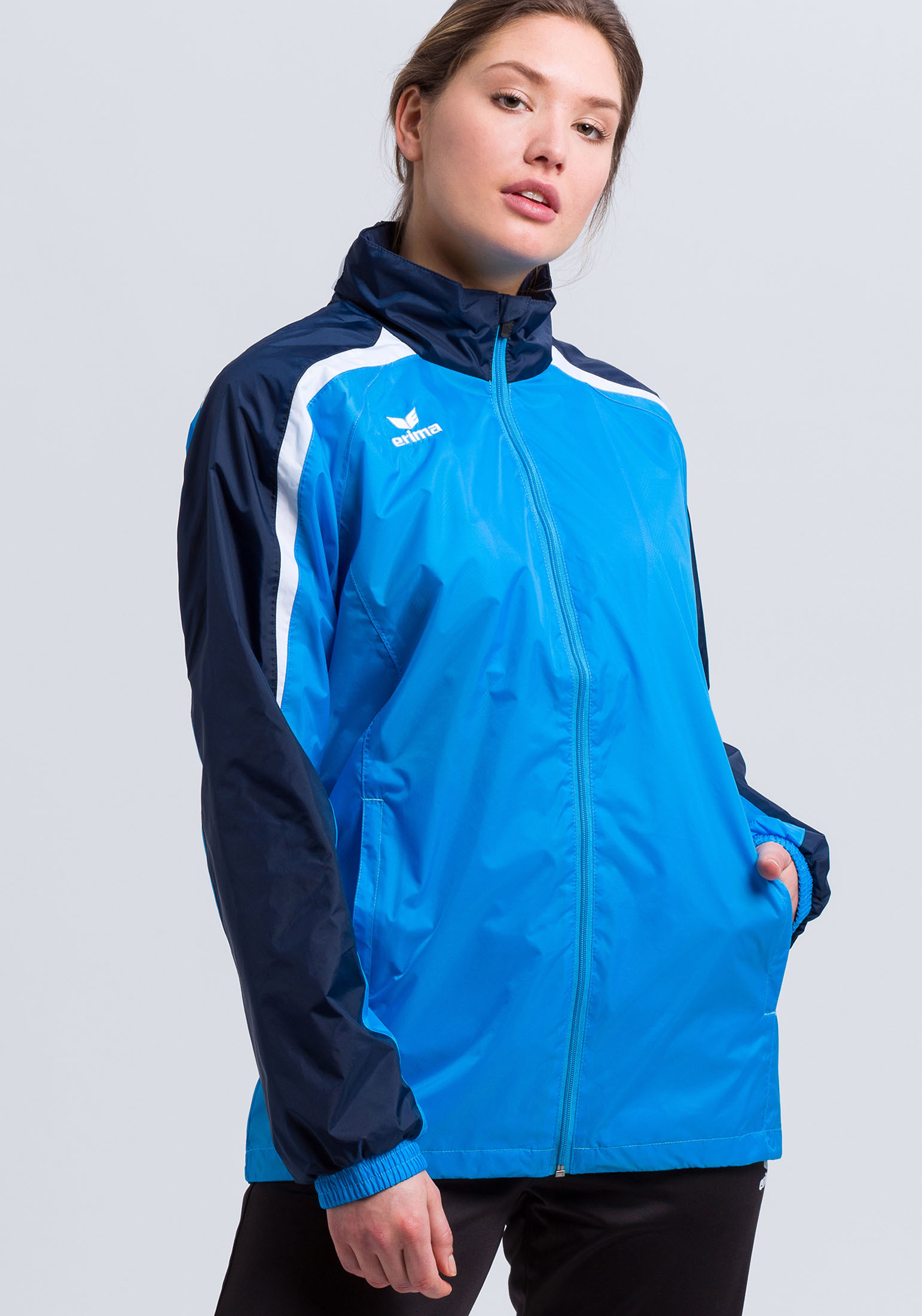 Функциональная куртка erima Liga 2.0 Allwetterjacke, цвет curacao/new navy/weiss