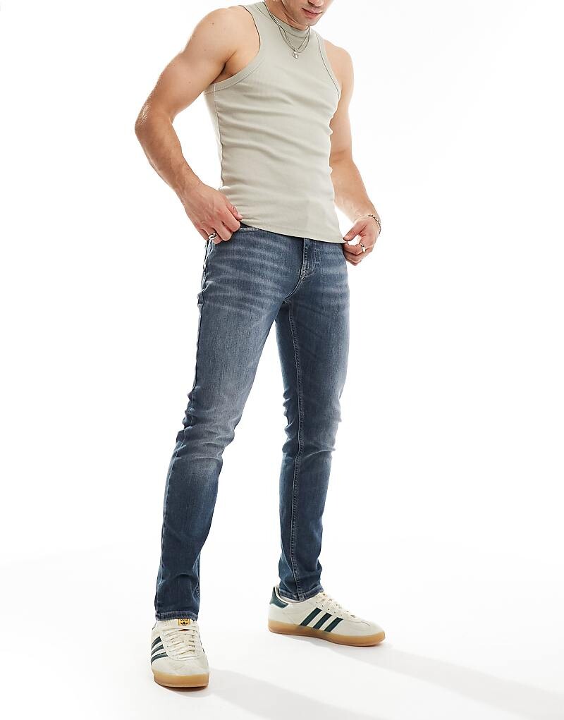 

Темно-серые зауженные джинсы с бакенбардами Tommy Jeans Austin