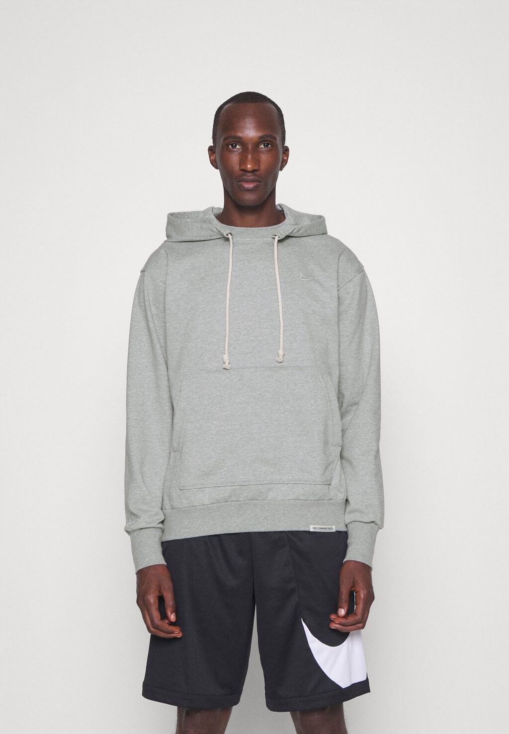 

Толстовка M DF STD ISS PO Nike, серый вереск/бледная слоновая кость
