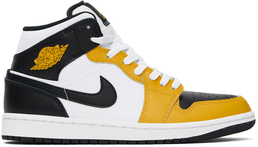 

Черно-желтые кроссовки Air Jordan 1 Mid Nike Jordan