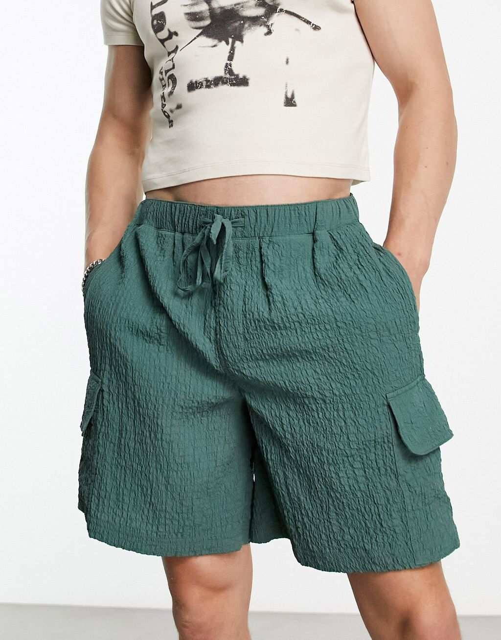 

Бирюзовые широкие шорты карго с жатой текстурой ASOS DESIGN