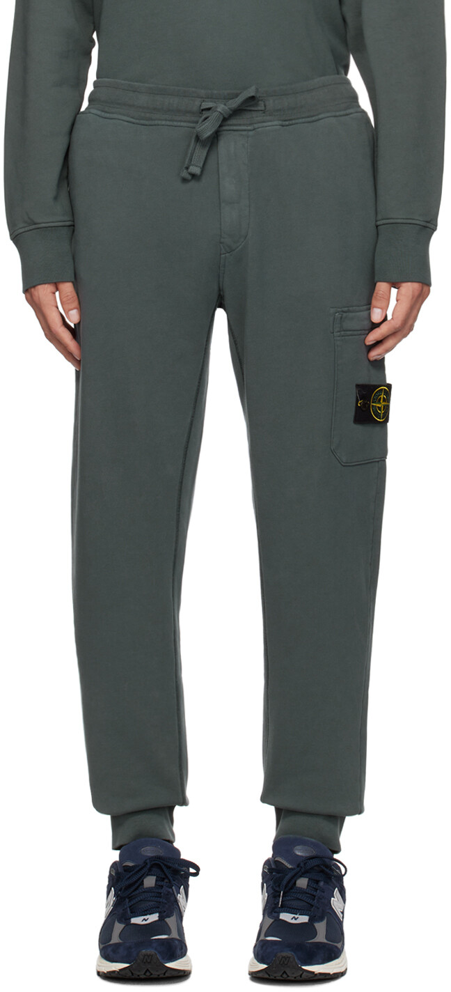 

Серые спортивные штаны на кулиске Stone Island