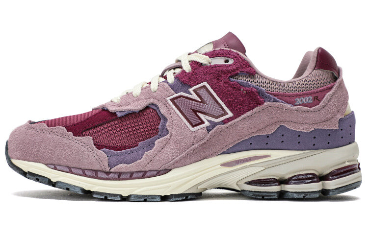 

Кроссовки унисекс New Balance 2002R, розовый / фиолетовый