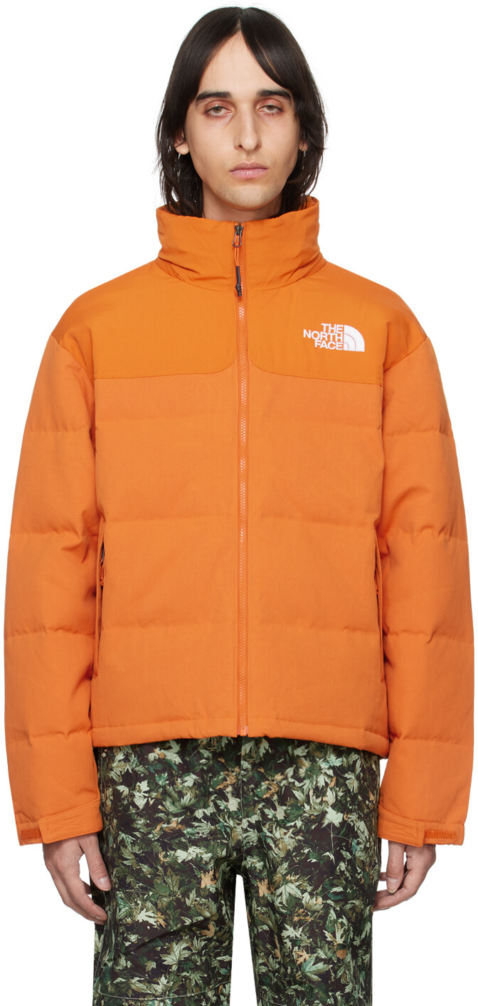 

Оранжевый пуховик 92 Нупце The North Face