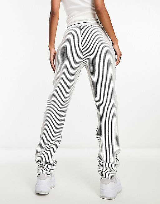 

Белые джоггеры с зауженным кроем и полосками Armani Exchange