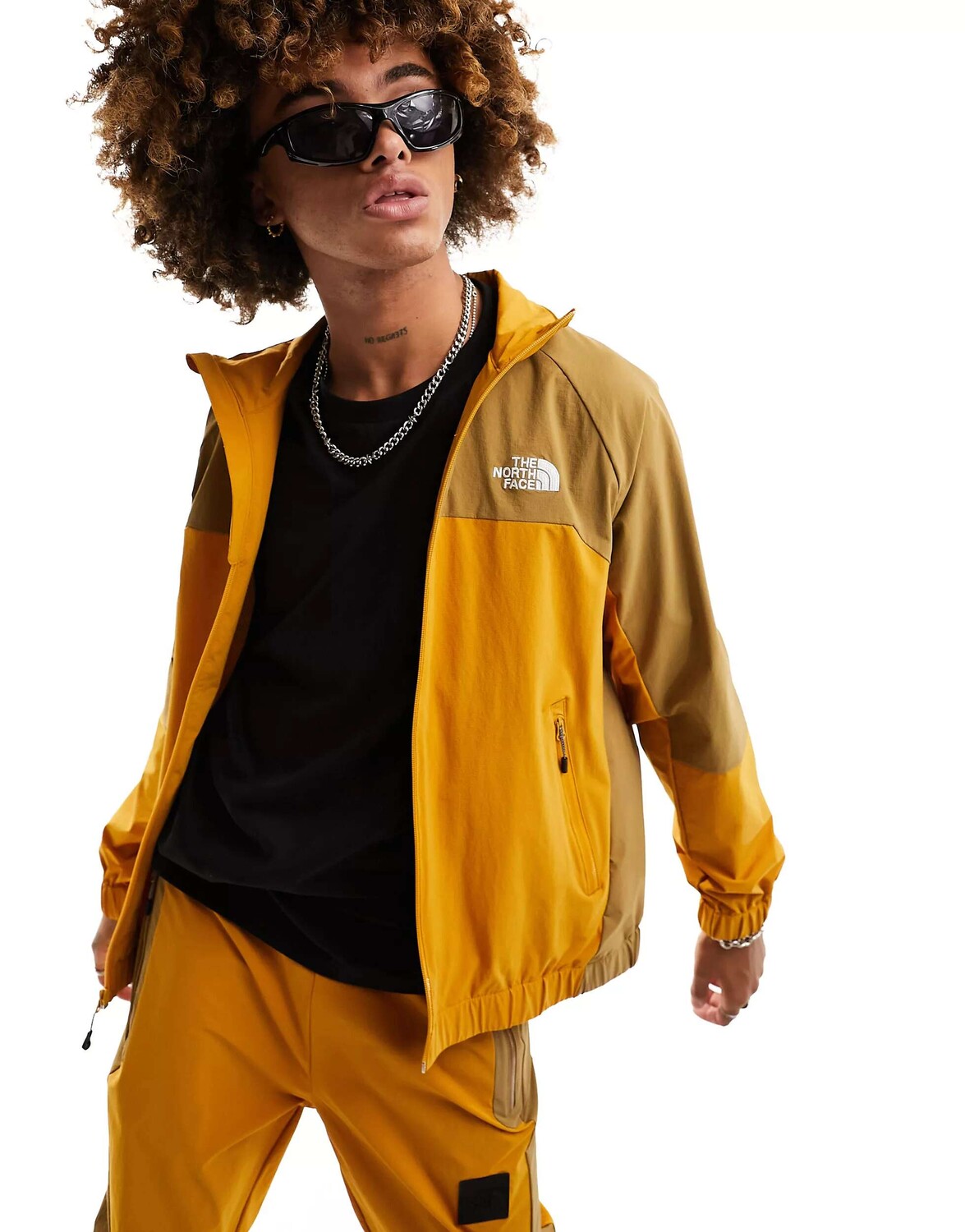 

Желто-коричневая спортивная куртка The North Face NSE, Коричневый