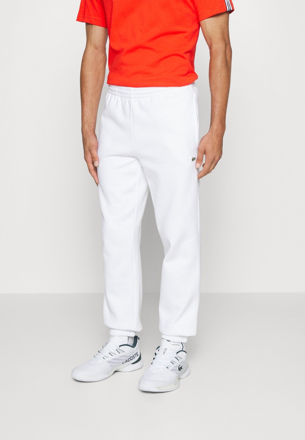 

Спортивные брюки Lacoste
