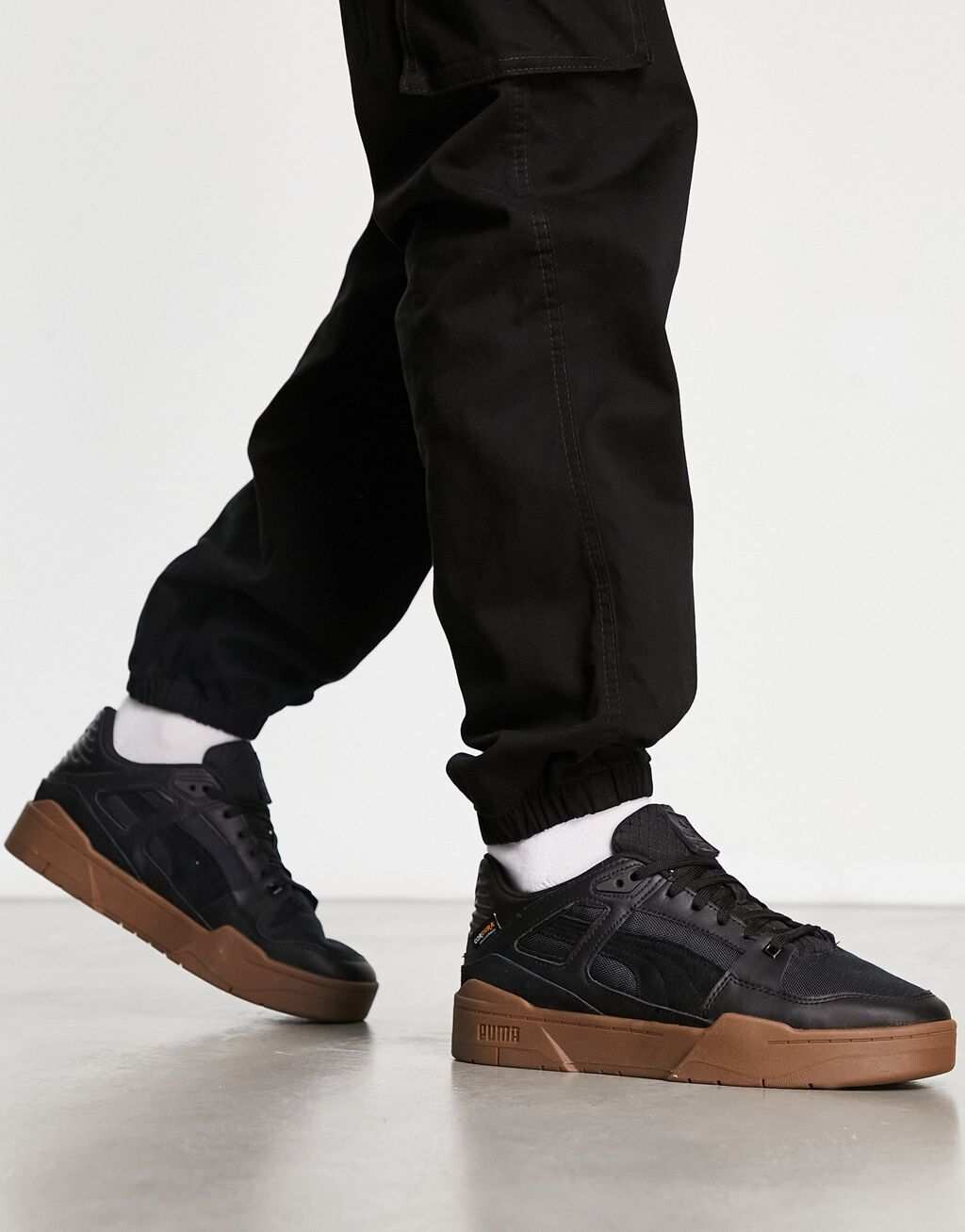 

Puma Slipstream Codura в цвете «черная пума»