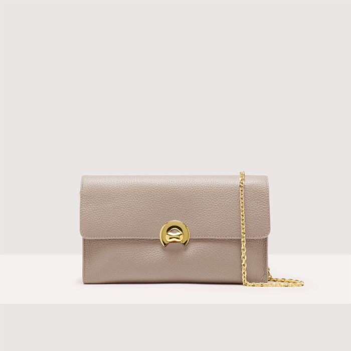 

Сумка на плечо из зерненой кожи Coccinelle BINXIE MEDIUM, розовый