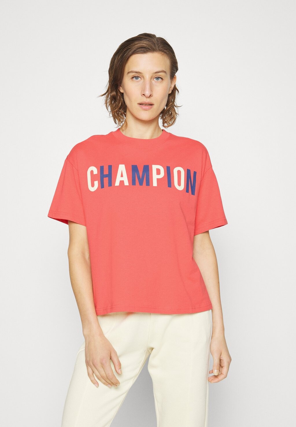 

Футболка с принтом CREWNECK Champion, абрикос