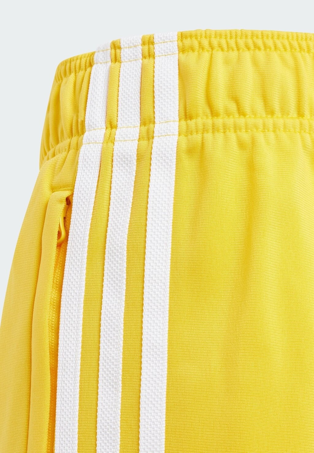 

Спортивные брюки TRACK PANTS UNISEX adidas, золотой