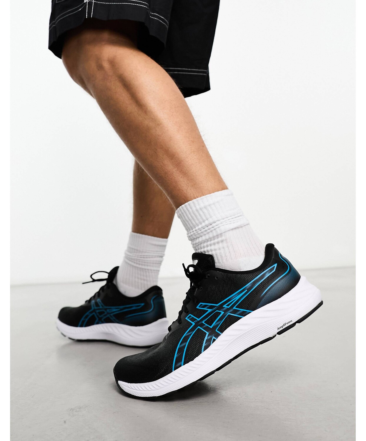 

Черные и синие беговые кроссовки Asics Gel-Excite 9