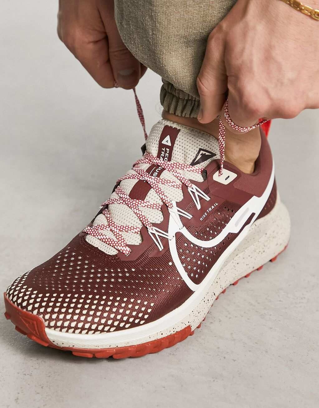 

Коричневые кроссовки Nike Running React Pegasus Trail 4