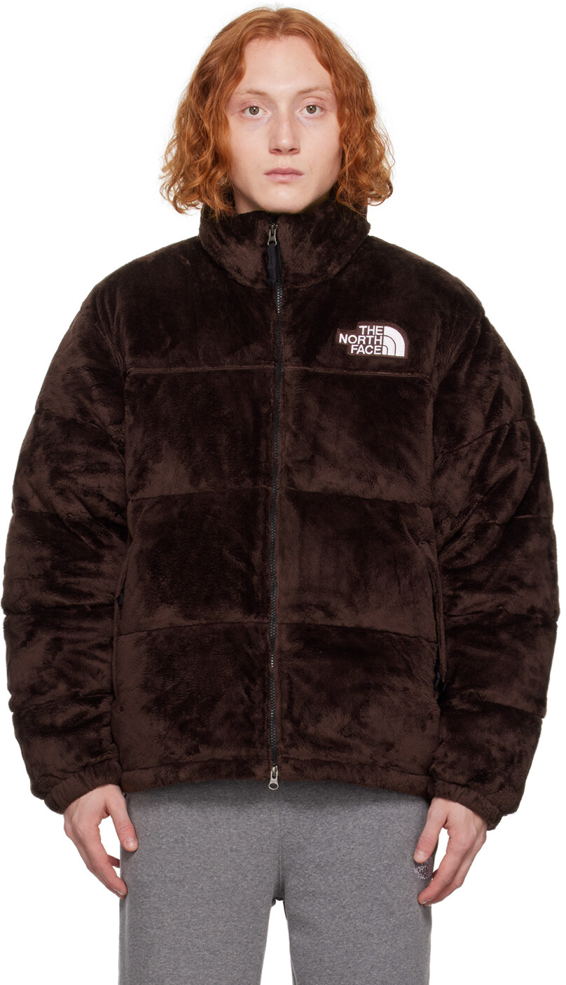 

Коричневый пуховик The North Face Versa
