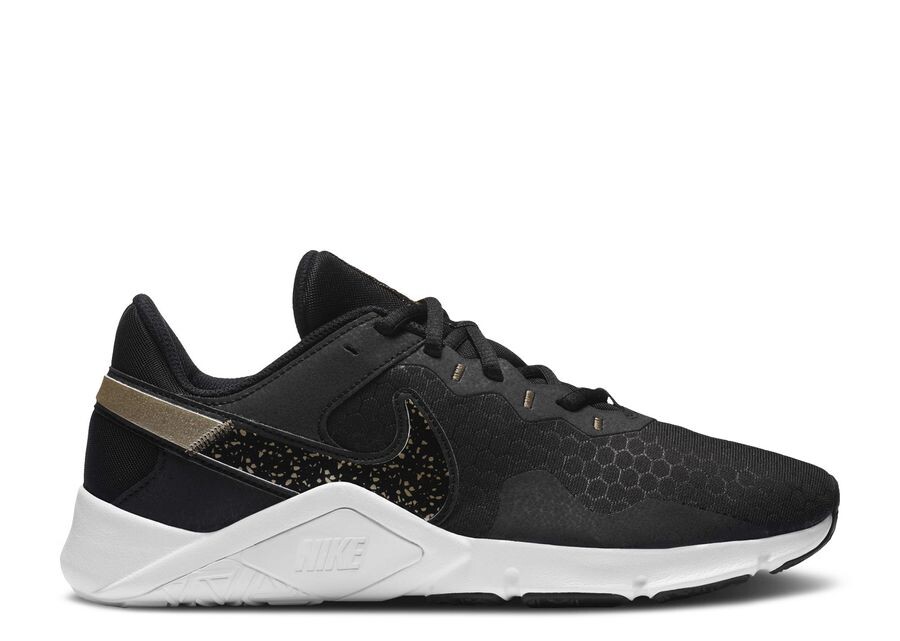

Кроссовки Nike Wmns Legend Essential 2 Premium, цвет Black Metallic Gold Grain
