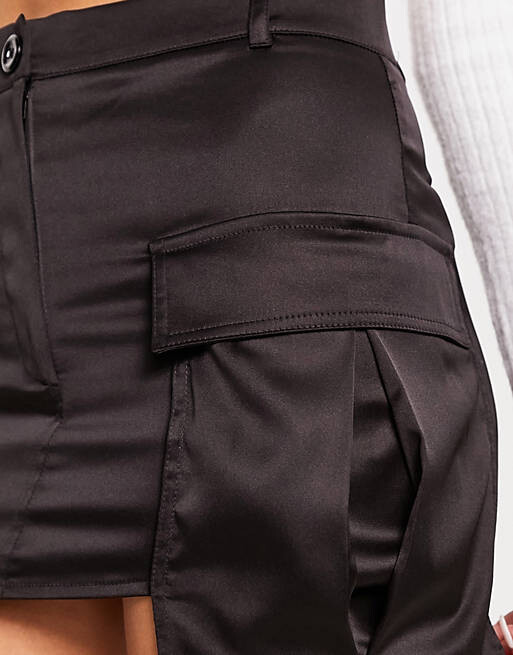 

Черная атласная юбка с карманами ASOS DESIGN