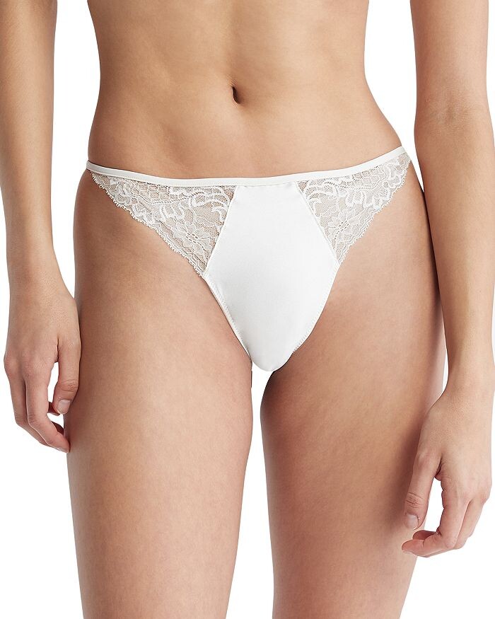 

Кружевные и атласные стринги Calvin Klein