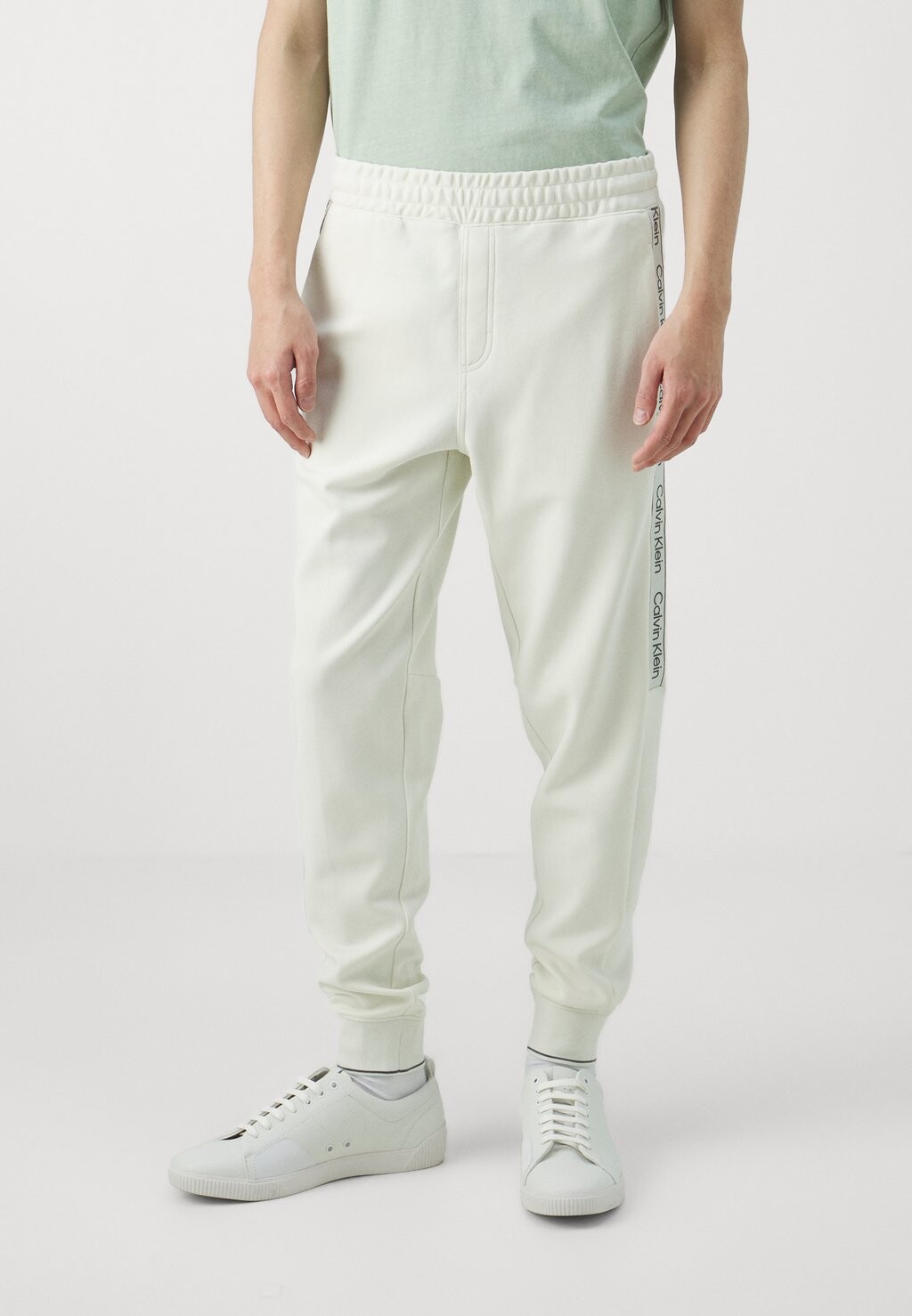 

Тренировочные брюки Calvin Klein, молочный