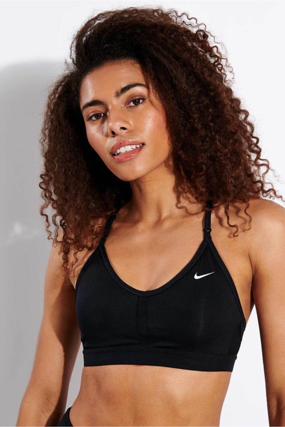 

Спортивный бюстгальтер - черный - однотонный Nike, черный