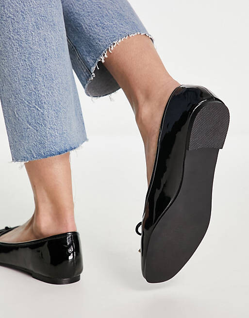 

Черные лакированные балетки с бантом schuh Leigh