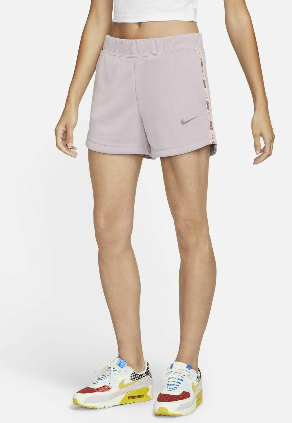 

Спортивные шорты Nike, розовое золото