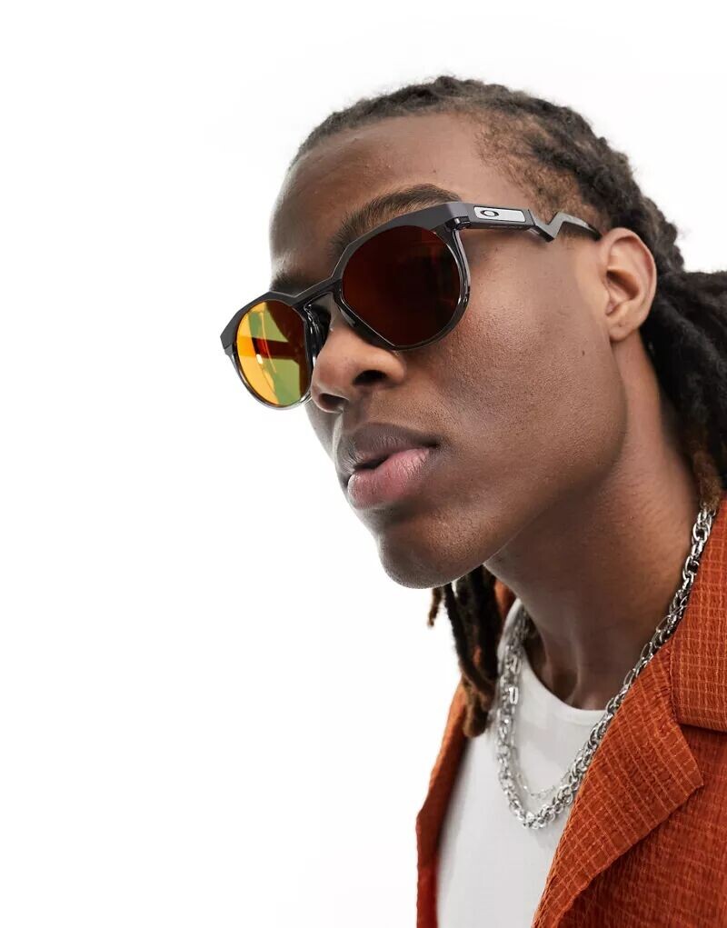 

Черные круглые солнцезащитные очки Oakley HSTN с оранжевыми светоотражающими линзами